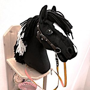 Schwarz-weiß geschecktes Hobby Horse